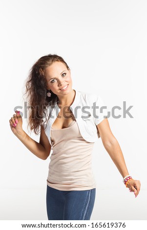 Beautiful girl on a white background dancing modern dance