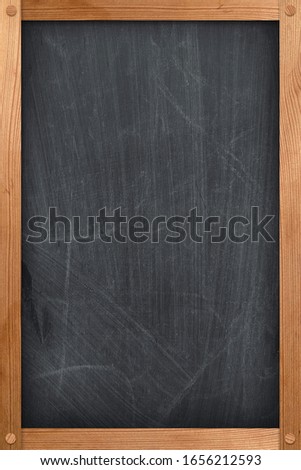 Blank antique blackboard texture with vintage wooden frame. 