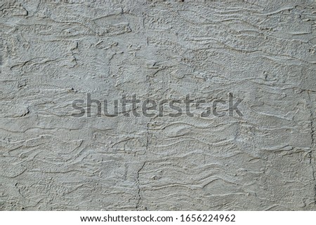 Old concrete wall close-up as a background.