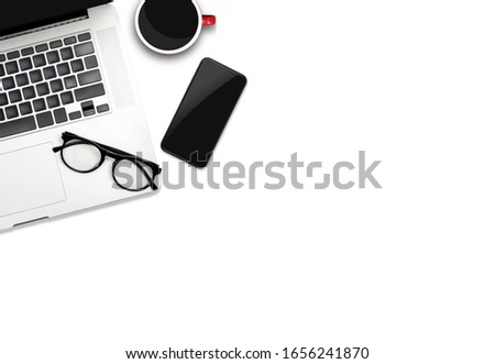 Work from home concept.Mock up of laptop and coffee, smartphone with blank screen isolated on white background. a business computer ,new work concept