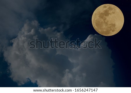 Full moon with blurred cloud at night.