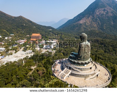 Aerial View  of Giant Buddha (The worlds's tallest outdoor seated bronze Buddha) & Po Lin Monastery in Hong Kong, Lantau Island
