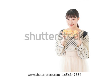 Young woman eating a snack