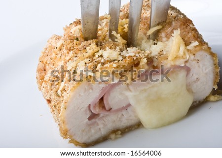 chicken cordon blue on a white plate breaded and close up Royalty-Free Stock Photo #16564006