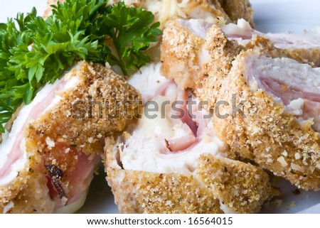 chicken cordon blue on a white plate breaded and close up Royalty-Free Stock Photo #16564015