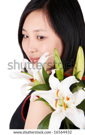 Asian woman and white lily.Isolated on white.