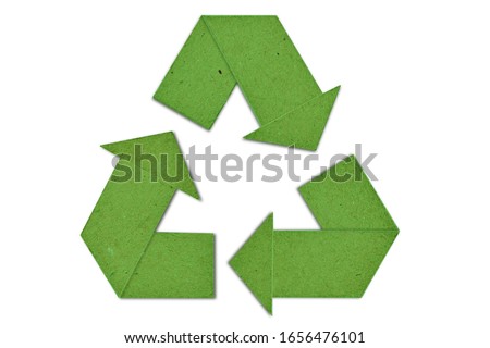 Green cardboard recycling symbol - Concept of ecology and paper recycling  Royalty-Free Stock Photo #1656476101