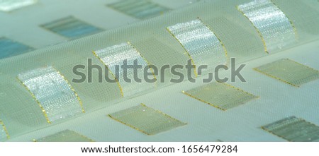 texture, background, pattern, postcard, silk fabric with metal square platinum inserts, edged with a gold line, ivory pastel colors,