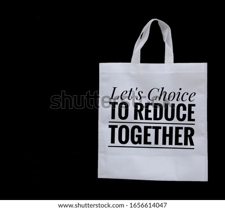 Let's Choice to Reduce Together with ECO White Bag on black background 