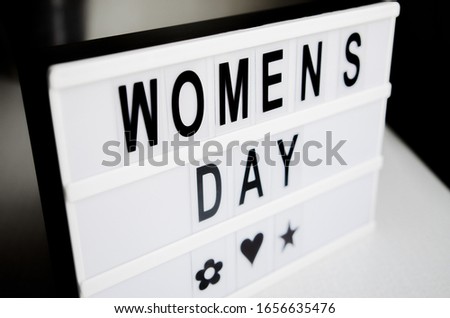 The inscription in dark letters on a white background Women's Day March 8