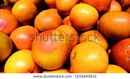 Grapefruits in grocery store - close up