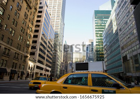 Yellow cabs on Park Avenue in midtown Manhattan, New York City, Unites States