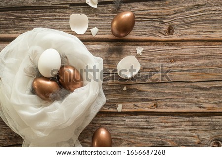 Easter composition on a wood background. Egg shell. Easter concept.