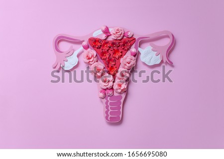 Concept polycystic ovary syndrome, PCOS. Paper art, awareness of PCOS, image of the female reproductive system Royalty-Free Stock Photo #1656695080