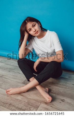 Beautiful asian young woman in blank white T-shirt..suitable for Mock-up.