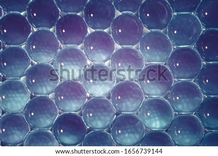 Blue gel balls. Macro of hydrogel refreshing background. Abstract wallpaper of bright 3d round pattern. Copy space. Detox, group, system concept