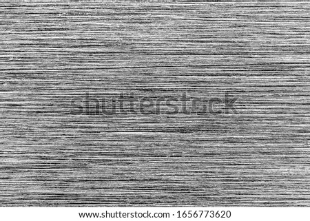 Silver metal texture with white scratches. Abstract noise black background overlay for design. Art stylized baner.