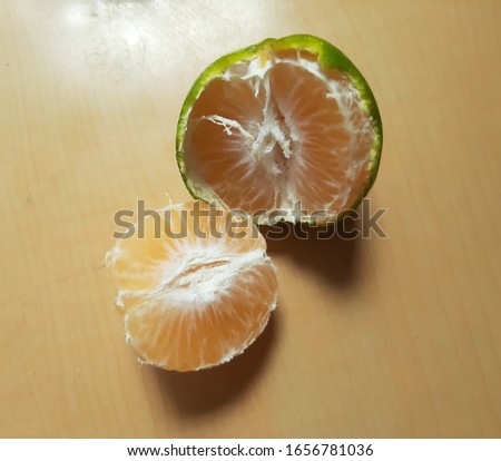 orange slice,Fruit Green Orange.Orange fruits are reversed.