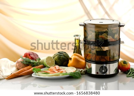 vegetables cooking into food steamer
