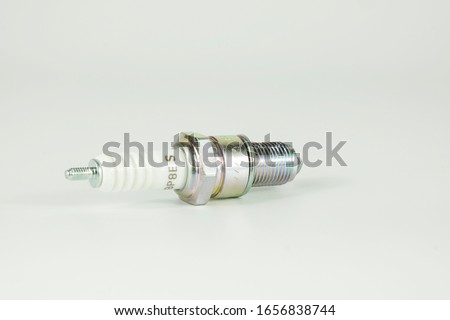 Spark plugs for motorcycles on isolated white backgrounds Motorcycle service