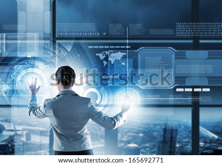Image of businesswoman pushing icon on media screen