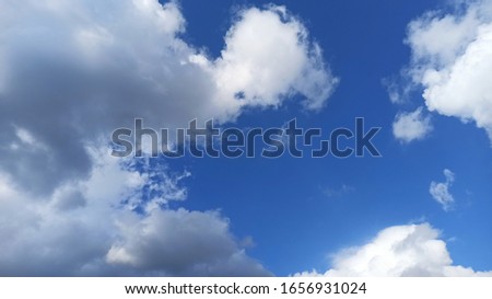 Cloudy in the blue sky
