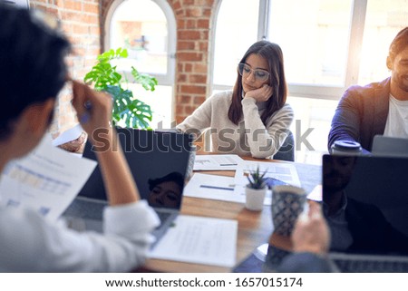 Group of business workers working together at the office
