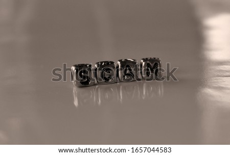 Scam - word from metal blocks on  - concept sepia tone photo on shine background
