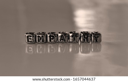 Empathy -  word from metal blocks  - concept sepia tone photo on shine background
 Royalty-Free Stock Photo #1657044637