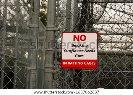 Sign outside the batting cages in San Luis Obispo, Ca. Royalty-Free Stock Photo #1657062637