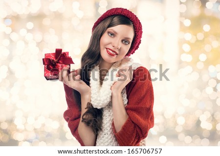 happy woman with christmas present