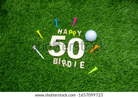 50th Birthday for golfer with golf ball and tee on green grass