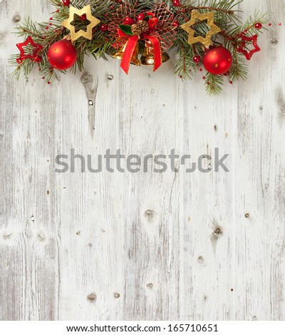 Christmas decoration on old grunge wooden board