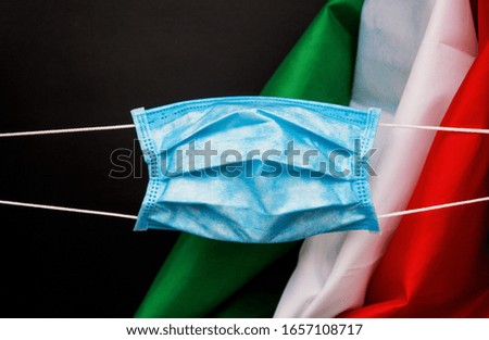 protective mask against italian flag - Coronavirus concept - Italy