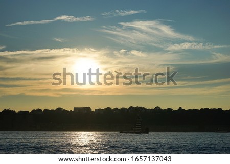 A Boat In The Sunset of New York on The Hudson River