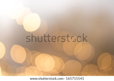 Abstract Yellow, Orange & Golden blurred lights christmas bokeh background 