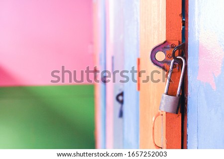 Door lock on the door old house.  selective focus