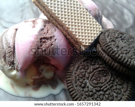 a mix of ice cream, wafers and delicious chocolate cake.