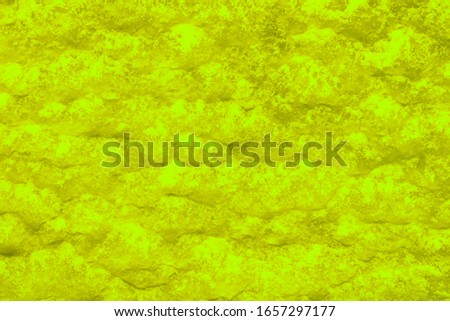 orange golden decorative plaster background, yellow sand ,wall with copyspace, abstract wallpaper close up ,yellow texture macro