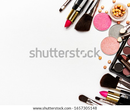 Set of decorative cosmetics on a white background. Flat lay, top view.