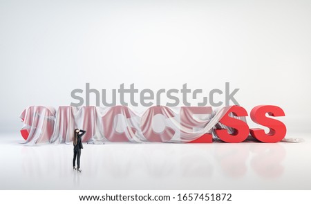 Businesswoman looking on big red success word  is covered with a presentation blanket. Success and startup concept. 3D Rendering