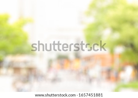 BLURRED CITY STREET WITH GREEN TREES, GREEN URBAN BACKGROUND