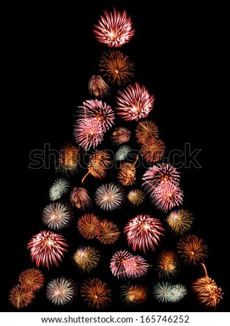 A Christmas Tree Made of Firework Bursts on a Black Background