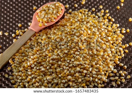 Popcorn kernels. Popcorn is a little different from the usual, as it pops if heated in a popcorn maker or other utensil. It has different requirements when planting and cultivating.