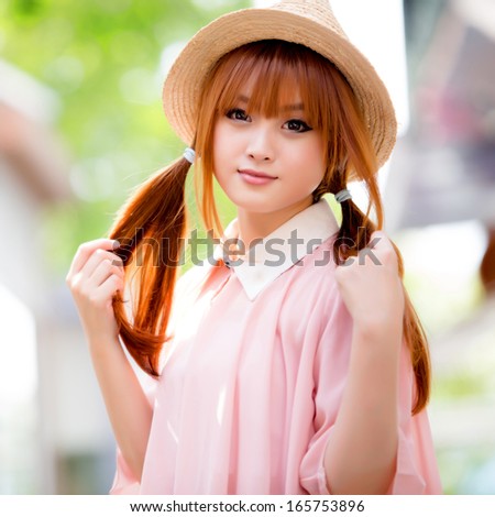 Beautiful asian girl in park 