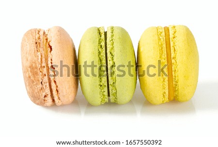 assortment of macaroon cookies isolated on white