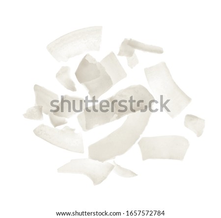 Fresh coconut flakes on white background, top view Royalty-Free Stock Photo #1657572784