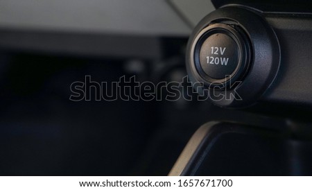 Close up the cellphone car charger Royalty-Free Stock Photo #1657671700