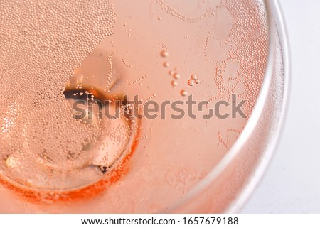 Pink Rose Champagne Glass With Bubbles Royalty-Free Stock Photo #1657679188