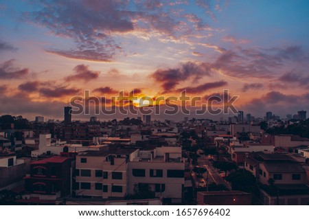 a beautiful sunset at the city